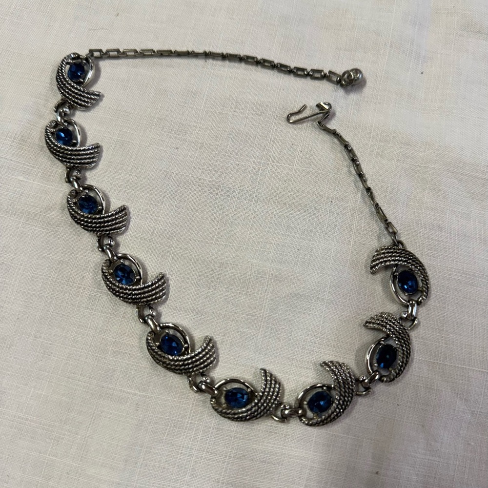 Vintage silver necklace with sapphire like blue stones. Elegant.